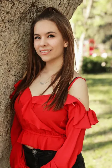 BLUSA MENINA EM RIBANA MANGA PRINCESA COM ESTAMPA E APLIQUE DE LAÇO
